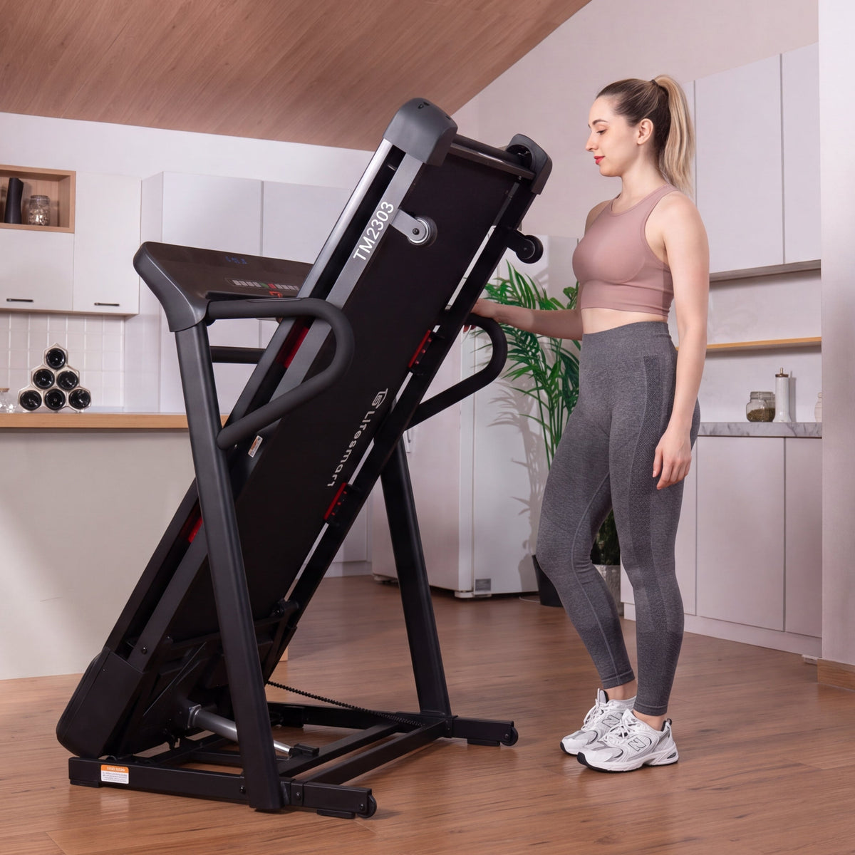 LifeSmart TM2303 Treadmill in a home setting showing how PowerTouch auto folding technology works