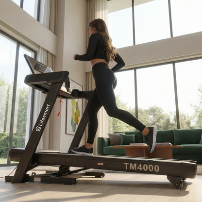 Woman jogging at incline to burn calories on a LifeSmart TM4000 treadmill in a modern living room