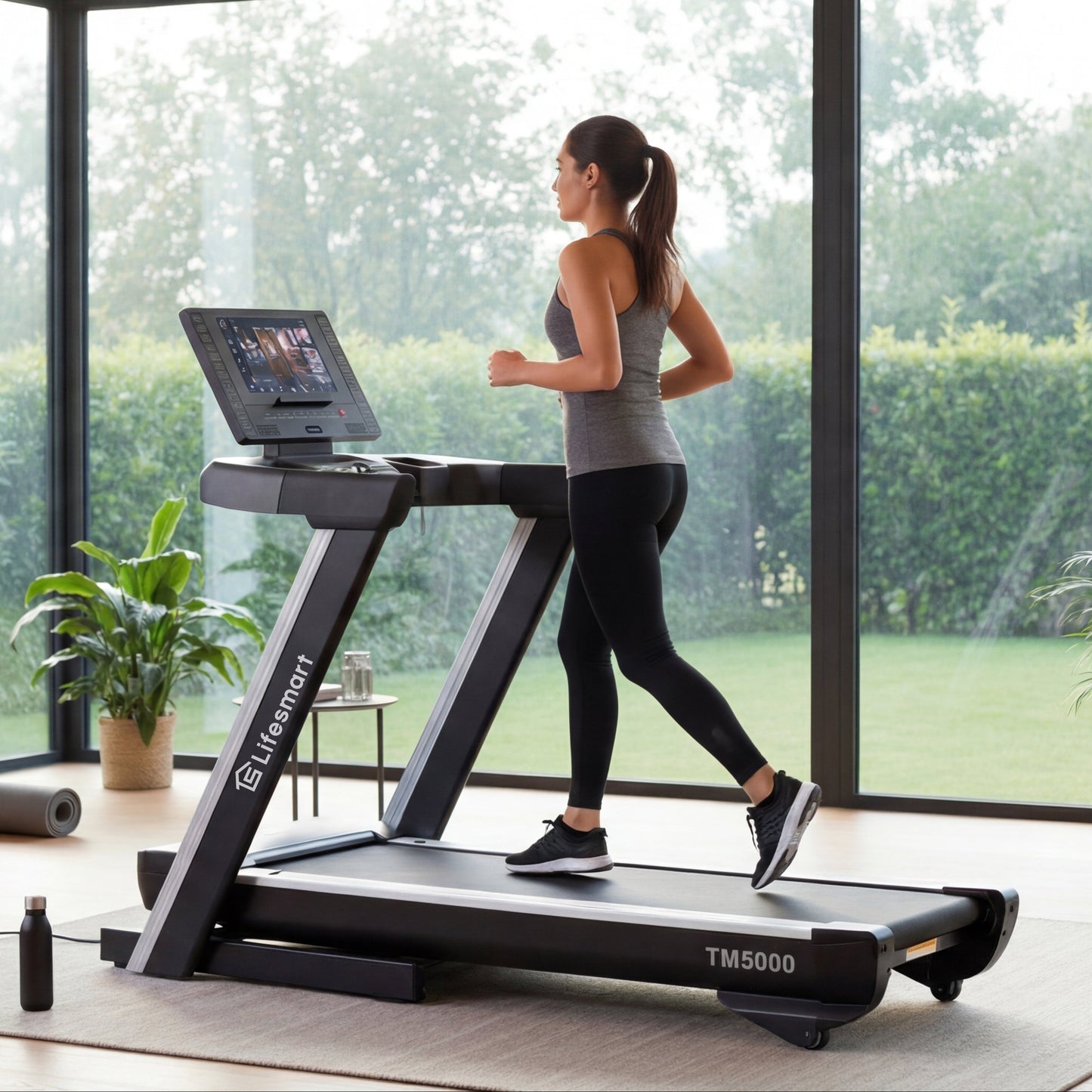 Healthy woman jogging on a TM5000 LifeSmart Treadmill with Incline and Decline